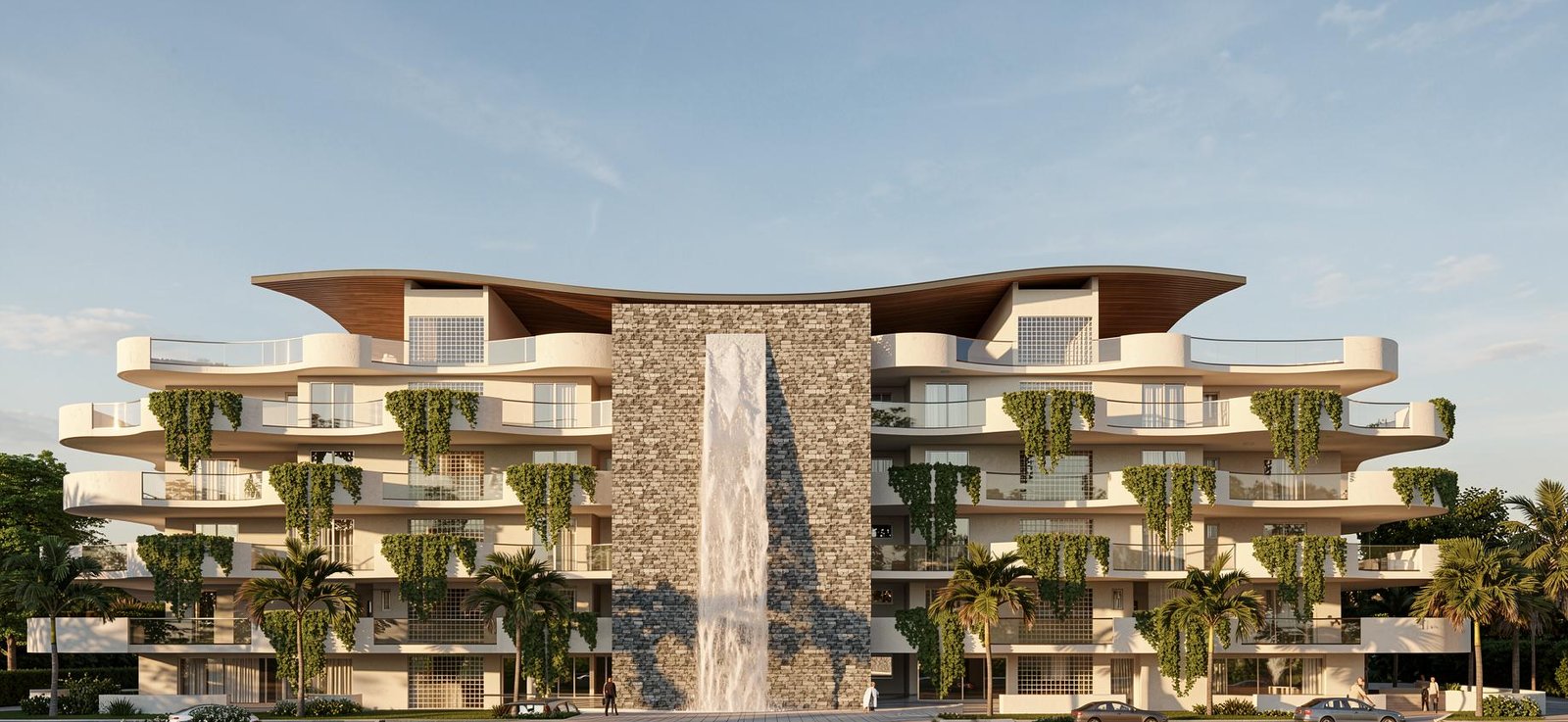 Edifício residencial com varandas orgânicas e parede de água em pedra natural